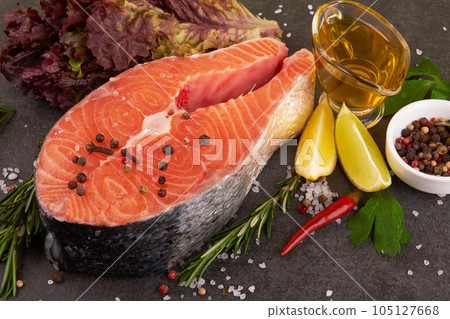 Salmon steak on black 105127668