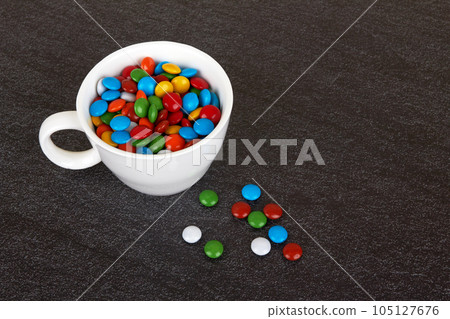 Candies on black 105127676