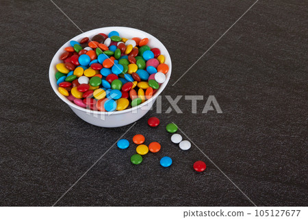 Candies on black 105127677