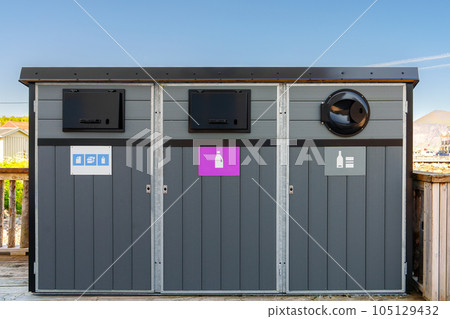 Recycling Garbage Bins Waste Sorting Concept Garbage collector on the street Waste sorting container Recycling Garbage Bins Waste Sorting Concept Garbage collector on the street Waste sorting container 105129432