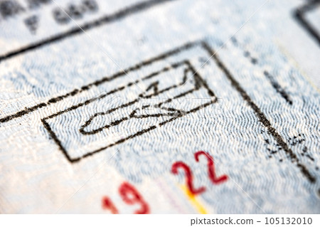 International travel visa passport stamp. Macro detail of European Union border International travel visa passport stamp. Macro detail of European Union border 105132010