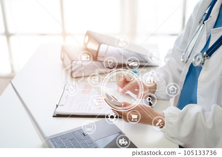 Doctor physician with stethoscope calculate medical fee costs & revenue. practitioner use calculator at Clinic. 105133736