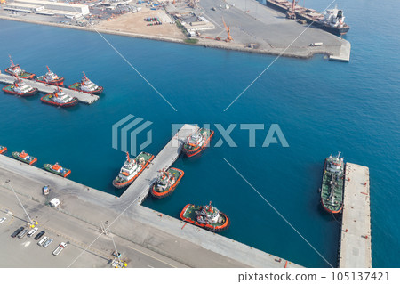 Fleet of tug boats of Jeddah Islamic Seaport, aerial photo Fleet of tug boats of Jeddah Islamic Seaport, aerial photo 105137421