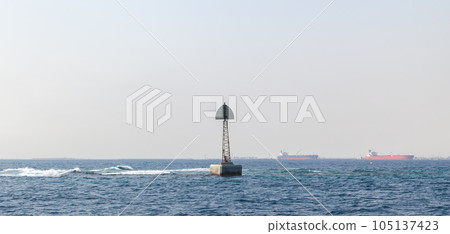 Beacon tower mounted on the border of a fairway 105137423