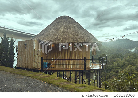Beautiful view of wooden cottage house 105138306