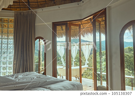 Cozy and beautiful interior in the bedroom 105138307