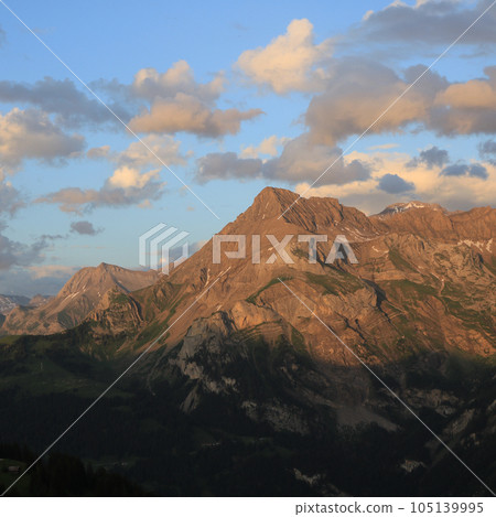 Peak of Mount Spitzhore in the golden evening light. Peak of Mount Spitzhore in the golden evening light. 105139995