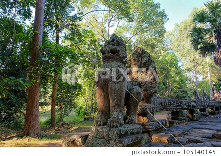 Photograph featuring the terrace preceding the Banteay Kdei Temple, embellished with majestic balustrades resembling guardian lions. 105140145