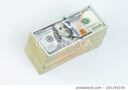 100 dollar bill pile 105140193