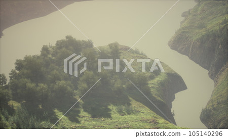 An aerial view of tropical rainforest in the morning misty 105140296