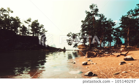 stunning natural haven, with a crystal-clear lake and towering evergreens 105140297
