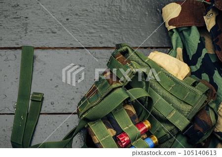 Khaki military uniform with ammunition close up 105140613