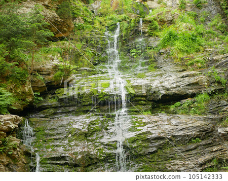 Waterfalls forest Vysoky vodopad, aerial drone stream way through stones fairytale summer landscape Jeseniky, beauty of virgin nature untouched primeval forest, crystal clear water wilderness Europe Waterfalls forest Vysoky vodopad, aerial drone stream way through stones fairytale summer landscape Jeseniky, beauty of virgin nature untouched primeval forest, crystal clear water wilderness Europe 105142333