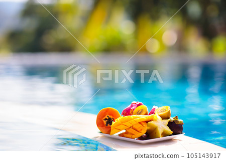 Tropical fruit at swimming pool 105143917