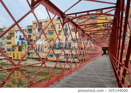 Bridge in Girona, Catalonia, Spain: Eiffel Bridge constructed by Gustave Eiffel over the Onyar River in Girona, Catalonia, Spain. Bridge in Girona, Catalonia, Spain: Eiffel Bridge constructed by Gustave Eiffel over the Onyar River in Girona, Catalonia, Spain. 105144000
