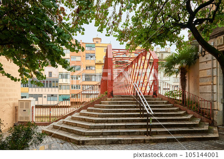 Bridge in Girona, Catalonia, Spain: Eiffel Bridge constructed by Gustave Eiffel over the Onyar River in Girona, Catalonia, Spain. Bridge in Girona, Catalonia, Spain: Eiffel Bridge constructed by Gustave Eiffel over the Onyar River in Girona, Catalonia, Spain. 105144001