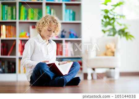 Child reading book. Kids read. School education. 105144038