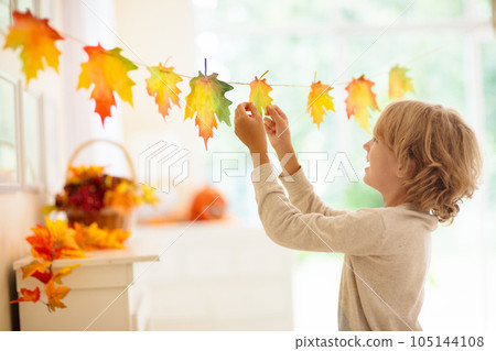 Autumn home decoration. Family decorating house. 105144108