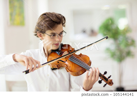 Man playing violin. Classical music instrument. 105144141