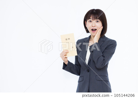 A surprised working woman in her 30s holding a pay bag in front of a white background A surprised working woman in her 30s holding a pay bag in front of a white background 105144206