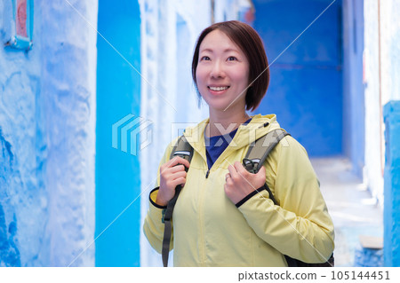 Woman sightseeing in Chefchaouen Woman sightseeing in Chefchaouen 105144451
