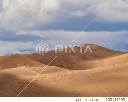 Sunny view of the landscape of Great Sand Dunes National Park and Preserve Sunny view of the landscape of Great Sand Dunes National Park and Preserve 105145395