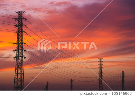 Power transmission towers lined up against the sky dyed in the sunset b-4 High saturation matte Power transmission towers lined up against the sky dyed in the sunset b-4 High saturation matte 105146963