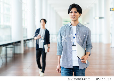 Young male engineers having a meeting in the office Young male engineers having a meeting in the office 105148947