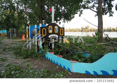 Aftermath of the hurricane July 19, 2023 Sremska Mitrovica, Serbia. Broken trees, mess on the streets. Broken branches on playground. Chips and trash. State of emergency after a catastrophic storm 105151692