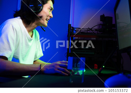 Young man playing games Lifestyle image Young man playing games Lifestyle image 105153372