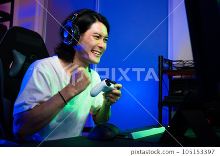 Young man playing games Lifestyle image Young man playing games Lifestyle image 105153397