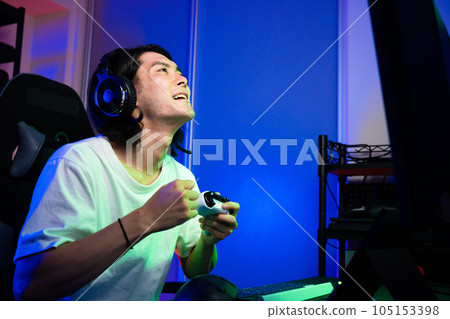 Young man playing games Lifestyle image Young man playing games Lifestyle image 105153398