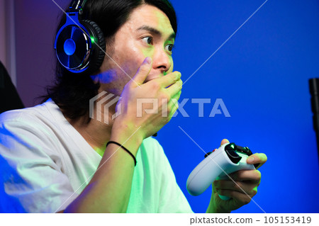 Young man playing games Lifestyle image Young man playing games Lifestyle image 105153419