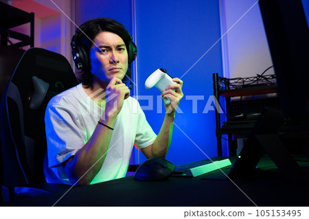 Young man playing games Lifestyle image Young man playing games Lifestyle image 105153495