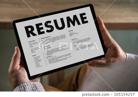 Businessmen Reading Resumes for a new job use laptops and CVs in the office. Applicant searching for new work Human resource interview, work resume, document resource 105154257
