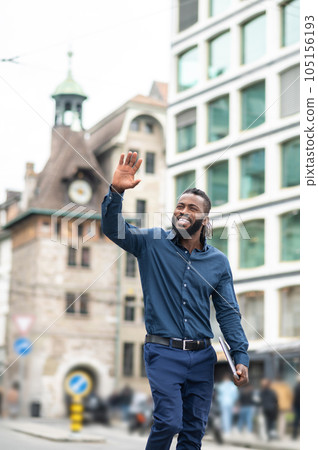 Young dark-skinned tall man in denim clothes looking confident 105156193