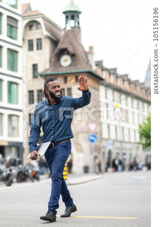 Handsome bearded dark-skinned man in the city center 105156196