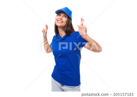active young brunette woman promoter in blue t-shirt and cap on white background with copy space active young brunette woman promoter in blue t-shirt and cap on white background with copy space 105157181