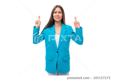 young office worker woman with black straight hair in a blue business jacket reports the news on a young office worker woman with black straight hair in a blue business jacket reports the news on a 105157273