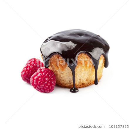 Cupcake with chocolate topping with raspberry on white backgrounds Cupcake with chocolate topping with raspberry on white backgrounds 105157855