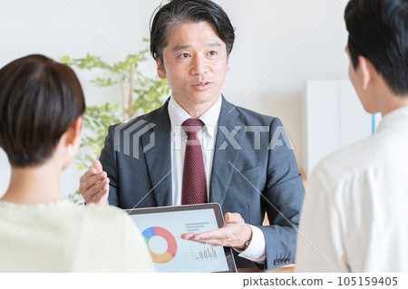 A businessman who works for a married couple 105159405