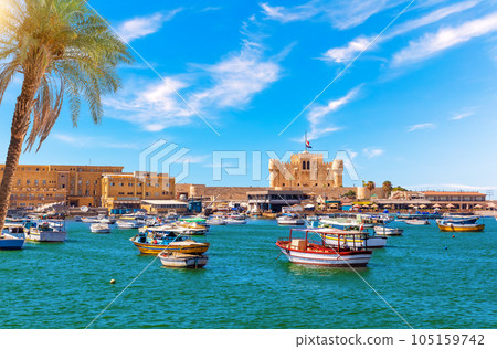 Alexandria harbour, boats near Qaitbay fort, point of the famous lighthouse, Egypt Alexandria harbour, boats near Qaitbay fort, point of the famous lighthouse, Egypt 105159742