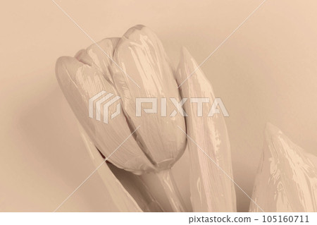 Beige tulip covered with acrylic paint on a beige background. Creative concept of skin care,cream. Beige tulip covered with acrylic paint on a beige background. Creative concept of skin care,cream. 105160711