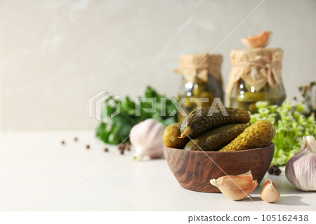 Tasty canned food concept, canned cucumbers, food for winter Tasty canned food concept, canned cucumbers, food for winter 105162438