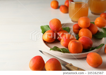 Composition with apricot, concept of tasty and fresh fruit Composition with apricot, concept of tasty and fresh fruit 105162567