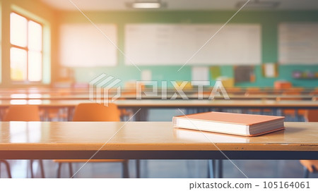 School classroom in blur background without young student. Blurry view of elementary class room no kid or teacher with chairs and tables in campus. Back to school concept 105164061