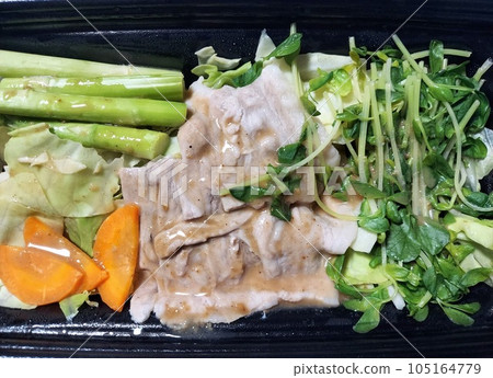 Microwave-steamed vegetables and pork with sesame sauce. Microwave-steamed vegetables and pork with sesame sauce. 105164779