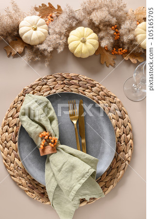 Thanksgiving day autumn table setting decoration in natural colors white pumpkins. 105165705