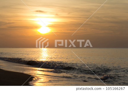 The sunset in morning on the beach. 105166267