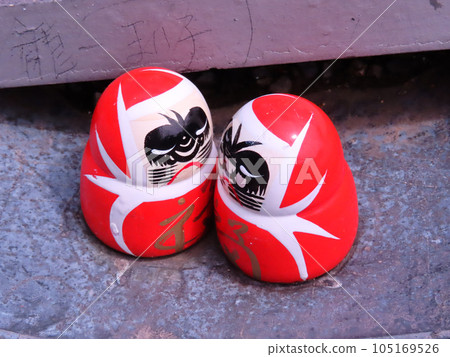 A pair of Daruma fortune slips in the precincts of Katsuo-ji Temple 105169526